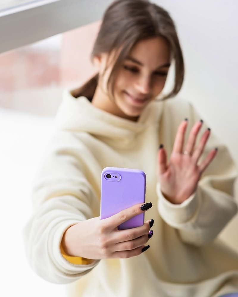 happy-female-blogger-taking-selfie-portrait-on-sma-JJ9WRFY.jpg